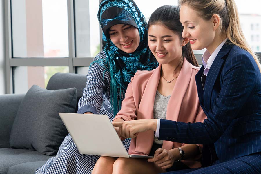 A diverse group of students taking advantage of Arab to English translation services 