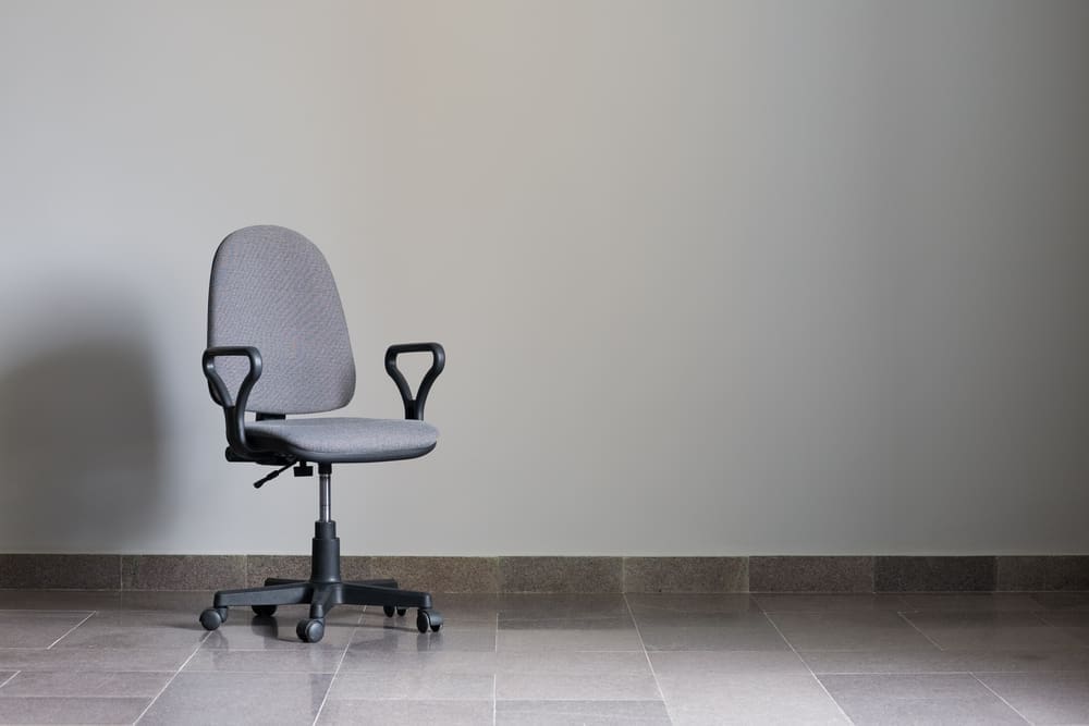Empty office chair in an empty room